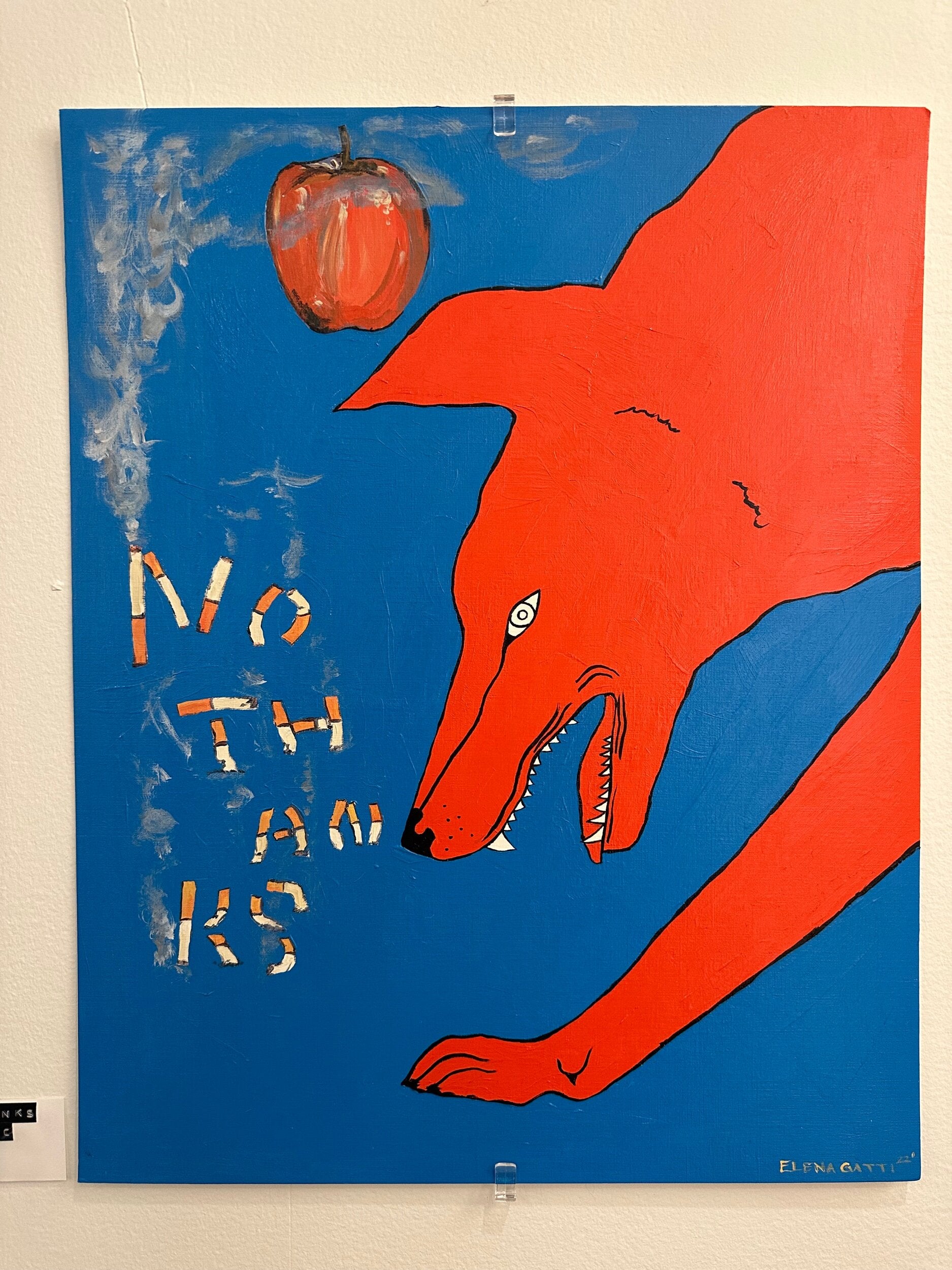 an image of a wolf with an apple above it with no thanks written out in cigarettes