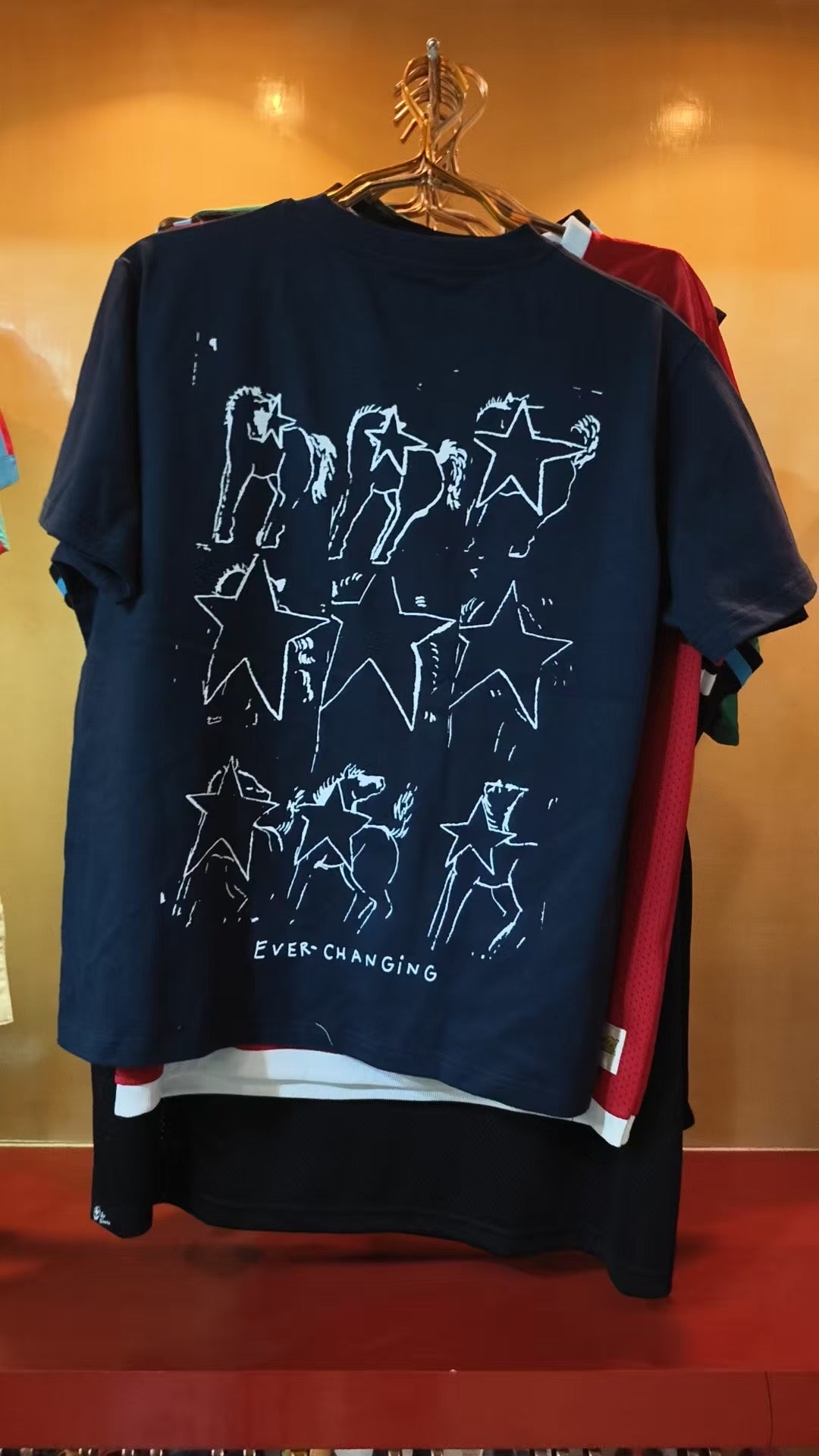 by frame tee